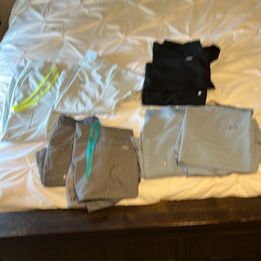 3 sets of Women’s Figs Scrubs.